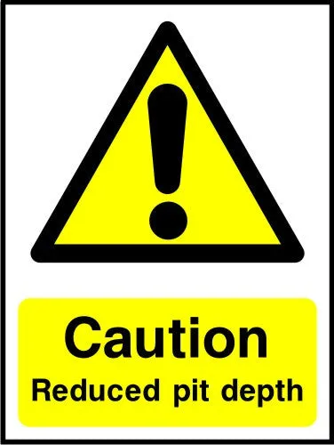 Caution Reduced pit depth sign