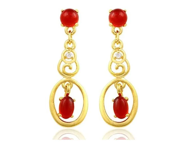 Fashionable long earrings with red ruby stones