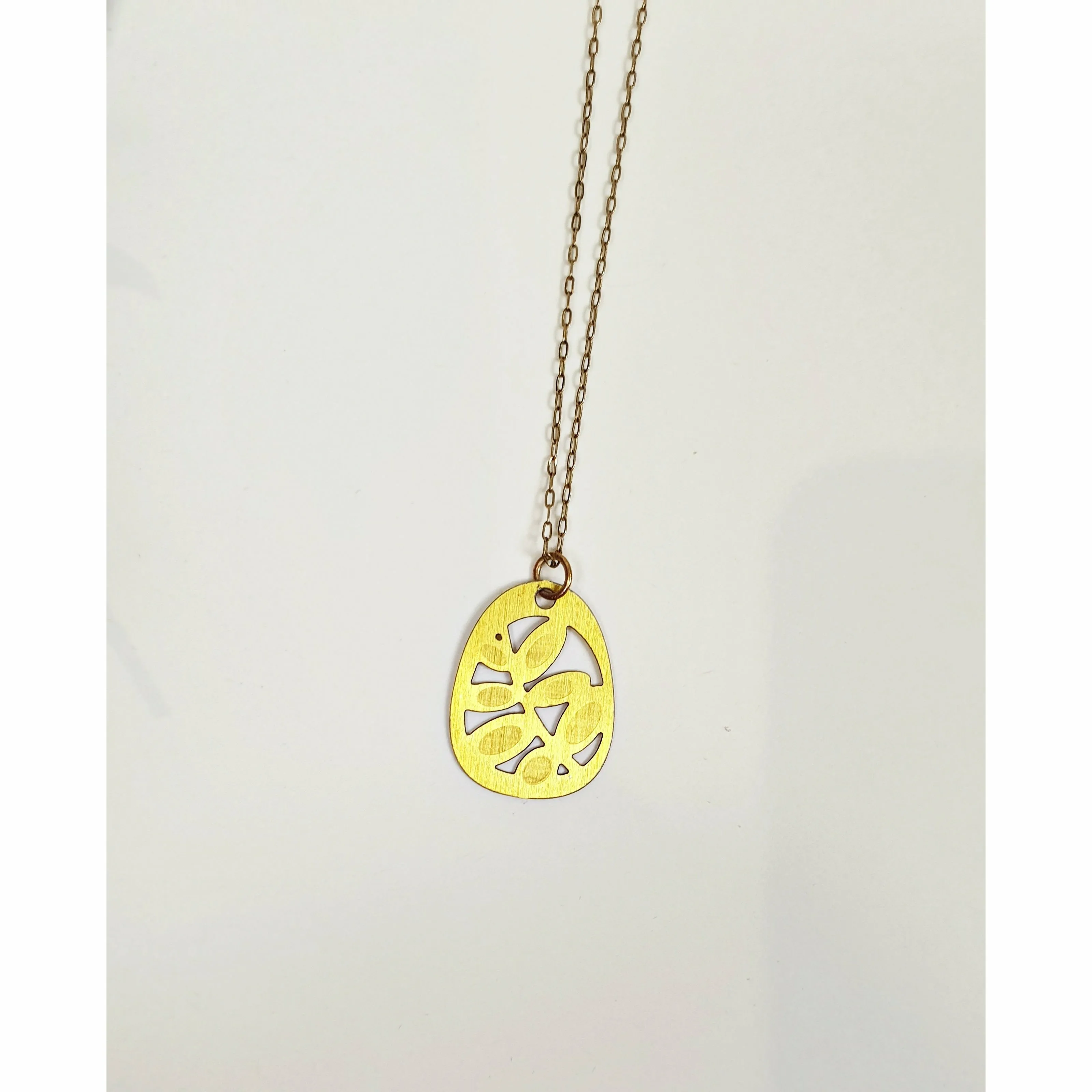 Gold necklace with unique pendant
