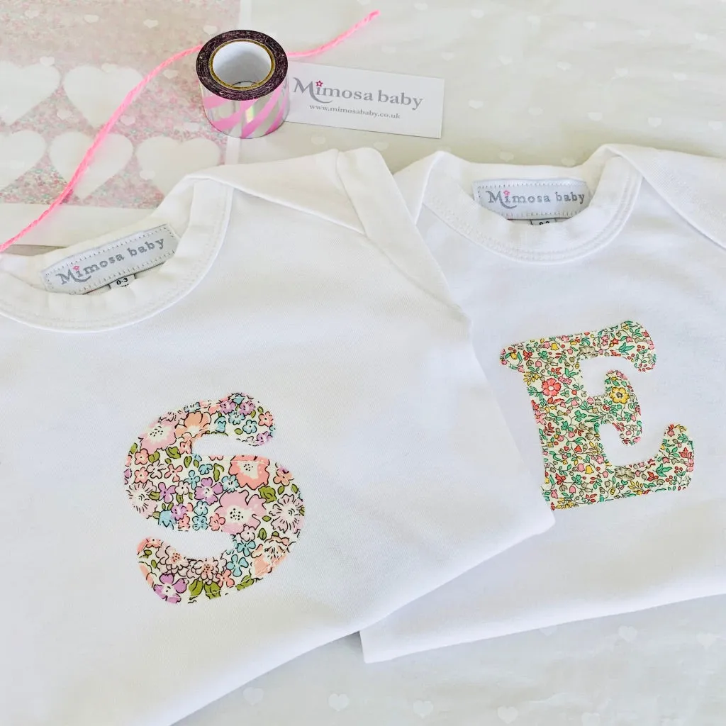 Initial bodysuit