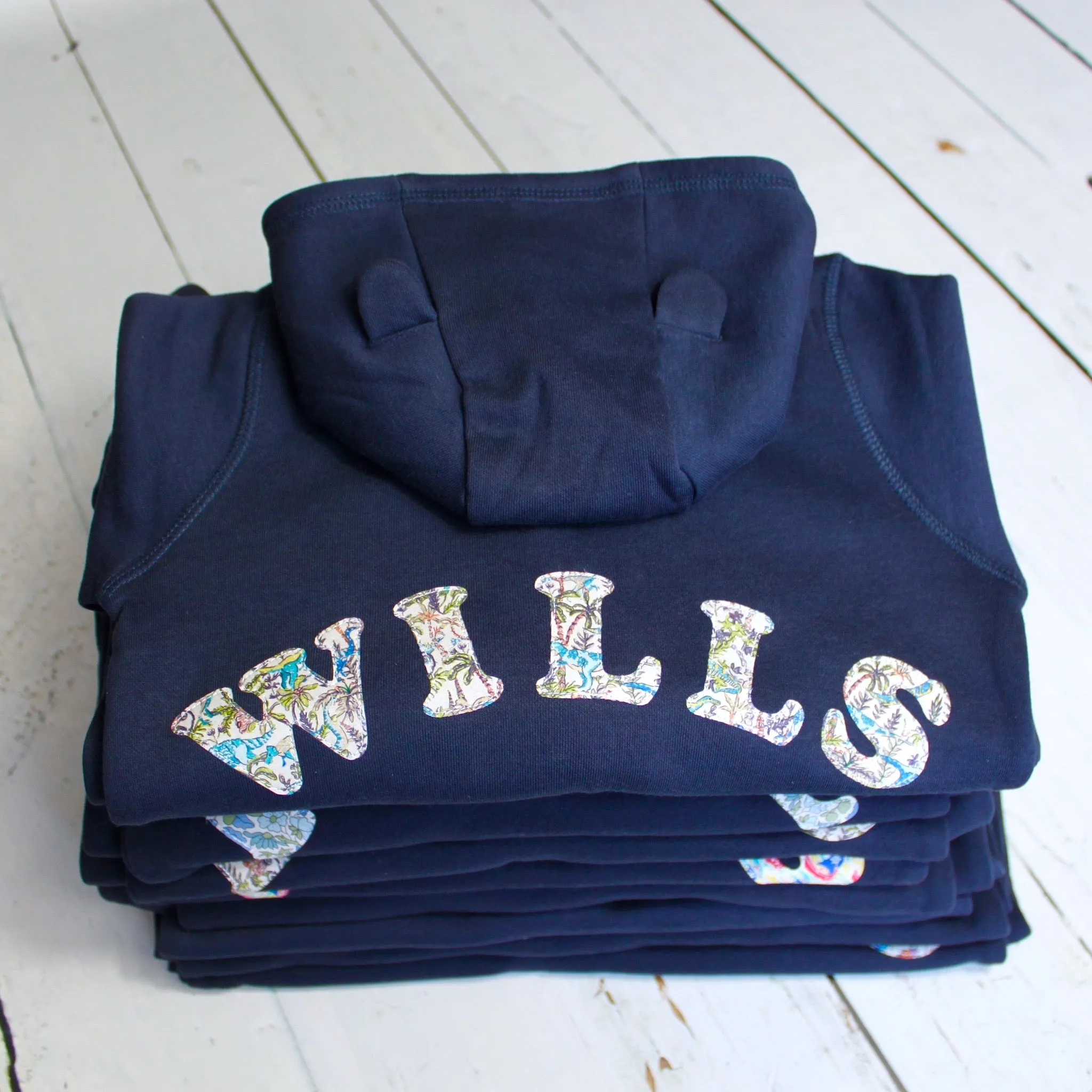 Name onesie with knee patches