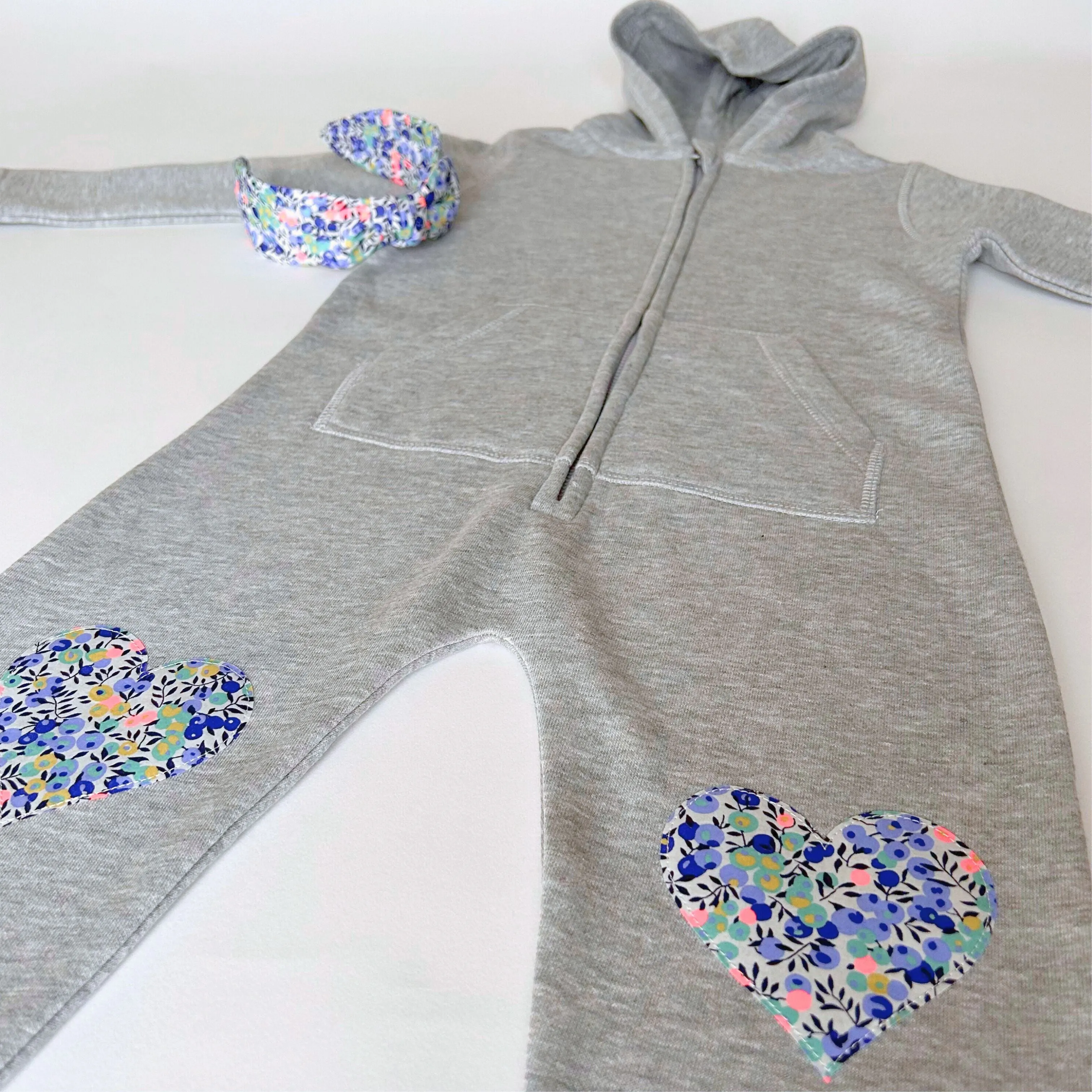 Name onesie with knee patches