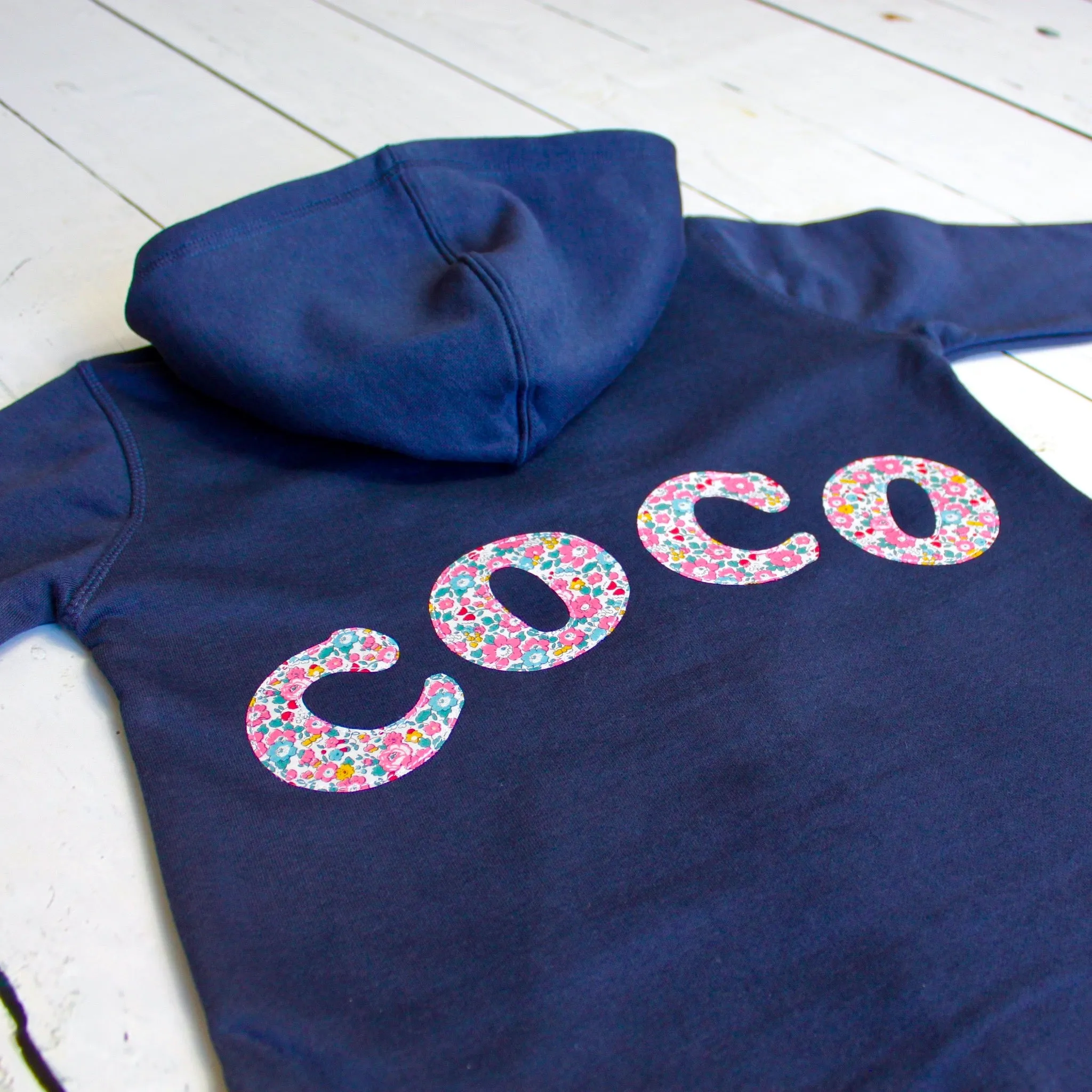 Name onesie with knee patches