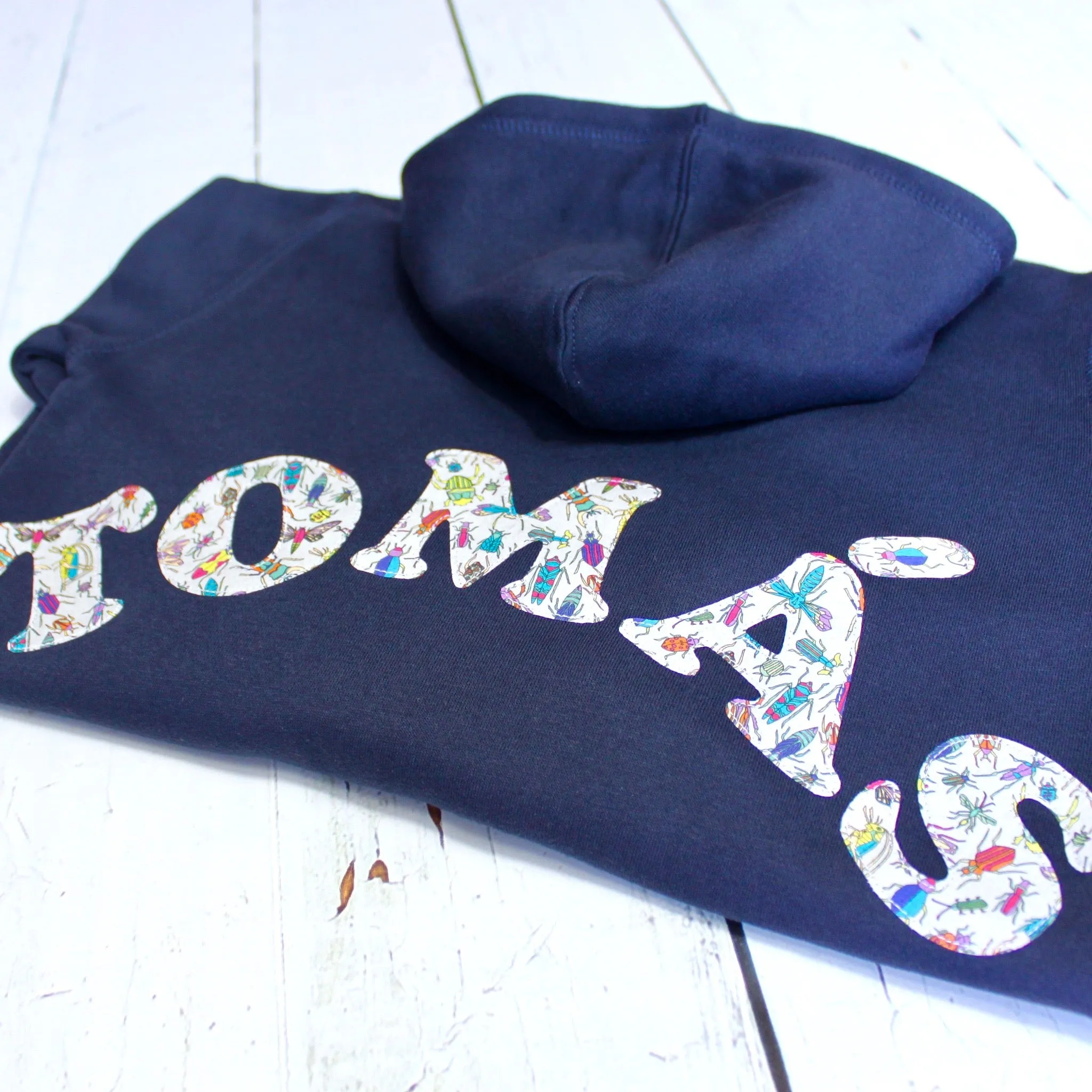Name onesie with knee patches
