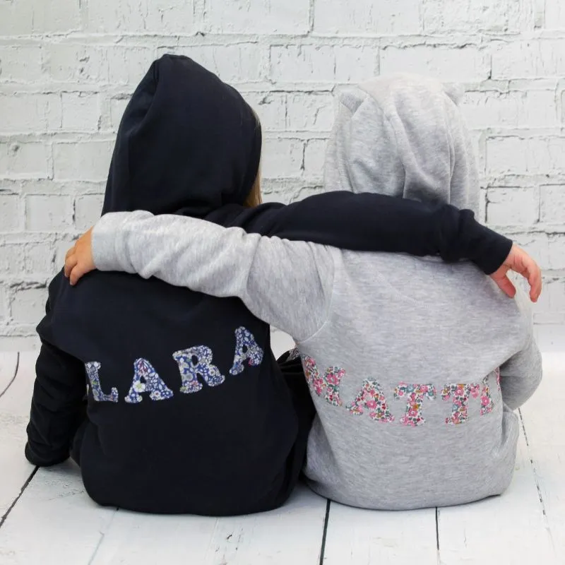 Name onesie with knee patches