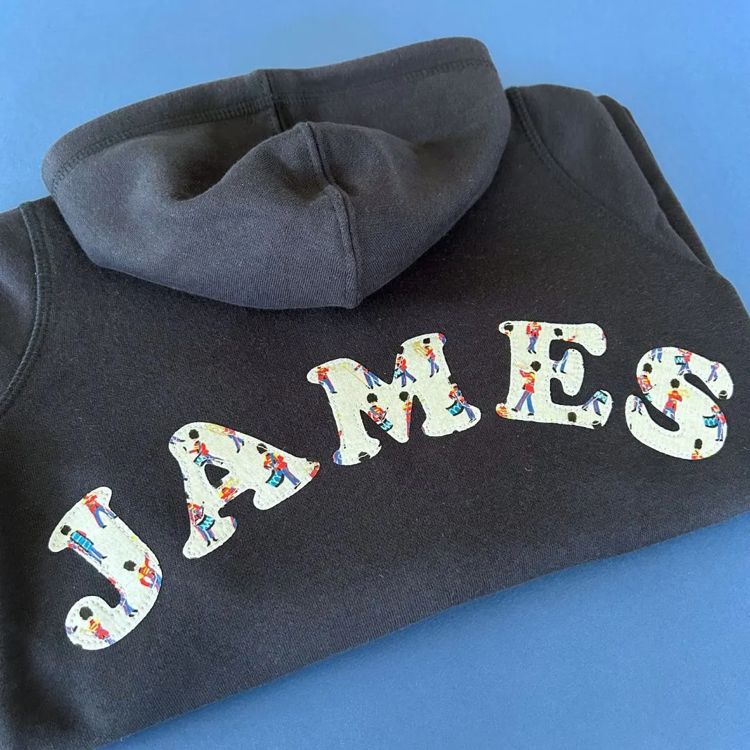 Name onesie with knee patches
