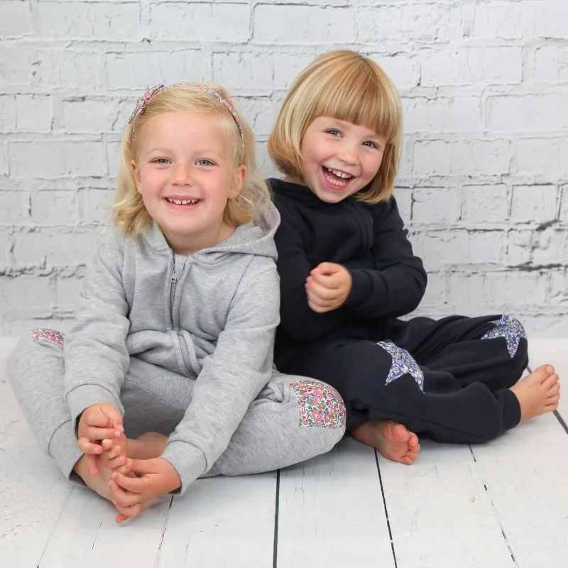 Name onesie with knee patches