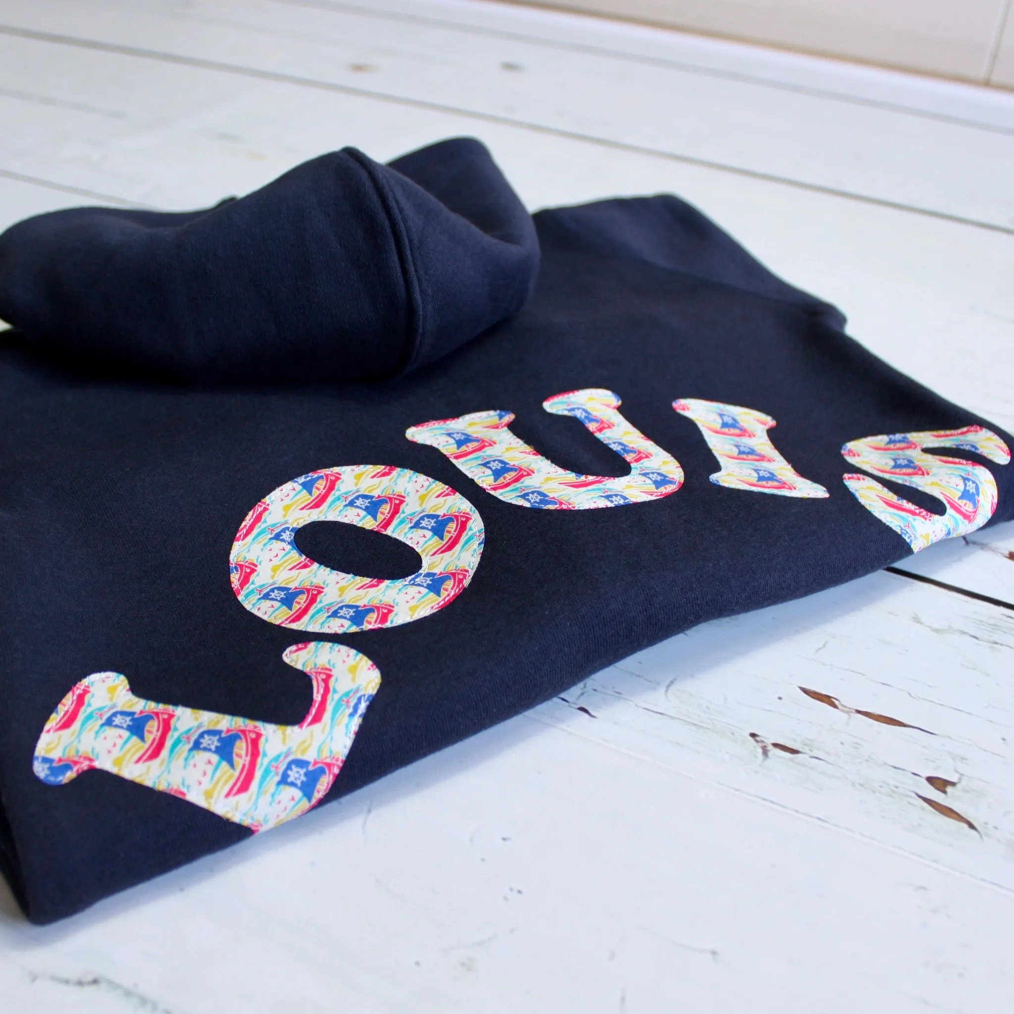 Name onesie with knee patches