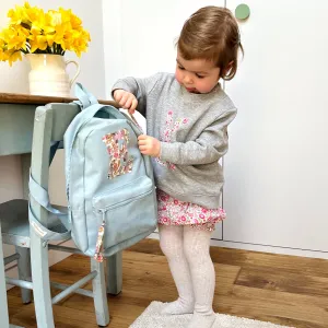 Pale blue initial backpack