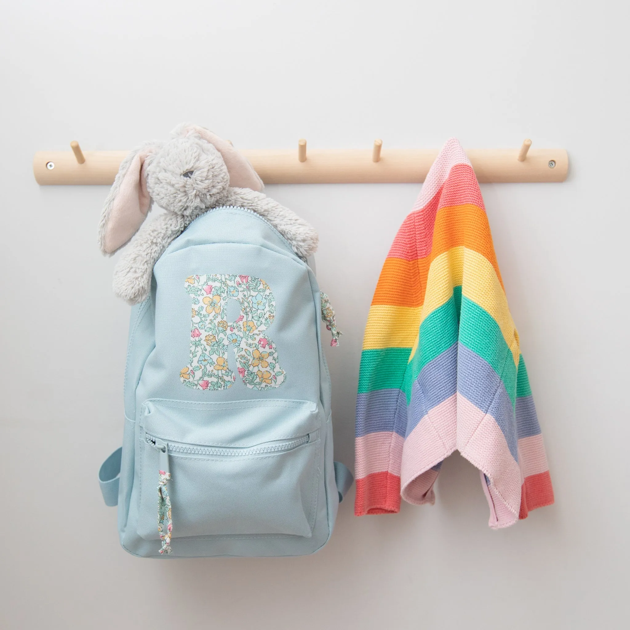 Pale blue initial backpack