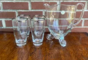 Roman Pitcher with 4 silver plated rimmed tumblers