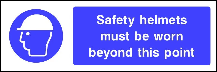 Safety helmets must be worn beyond this point sign