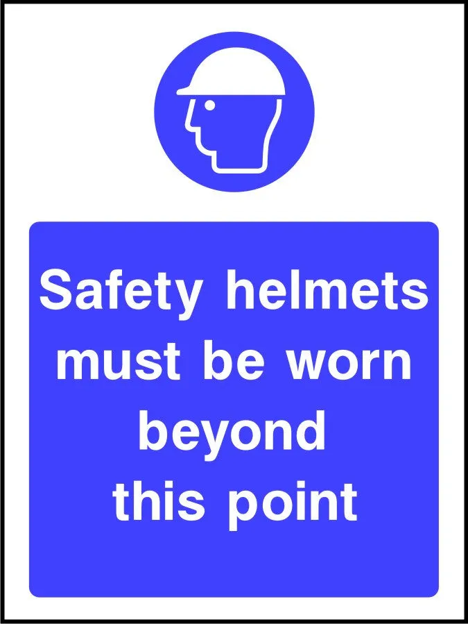 Safety helmets must be worn beyond this point sign