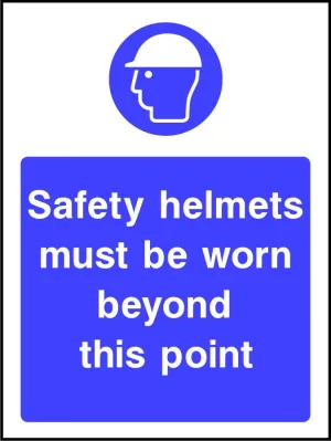 Safety helmets must be worn beyond this point sign