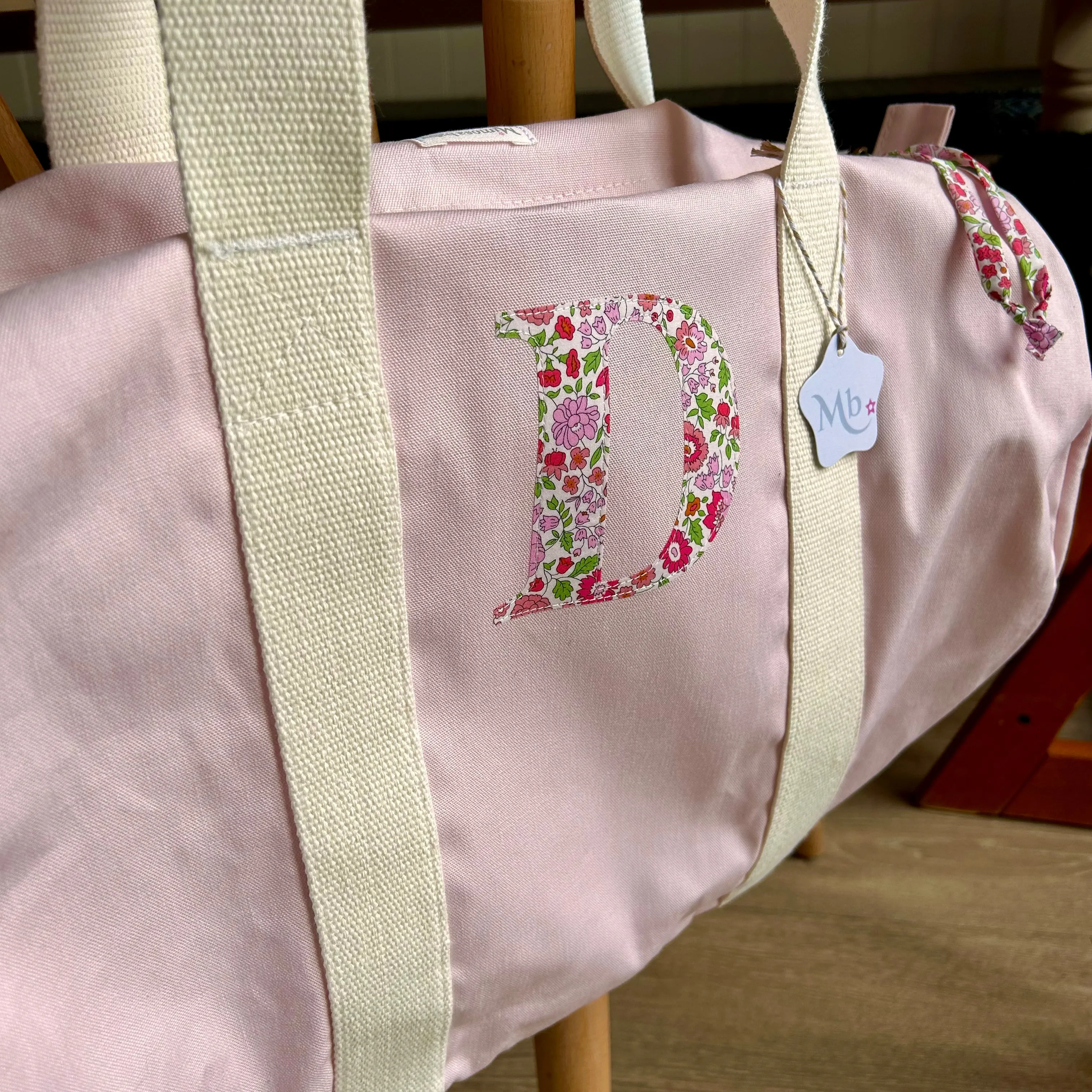 Single initial barrel bag